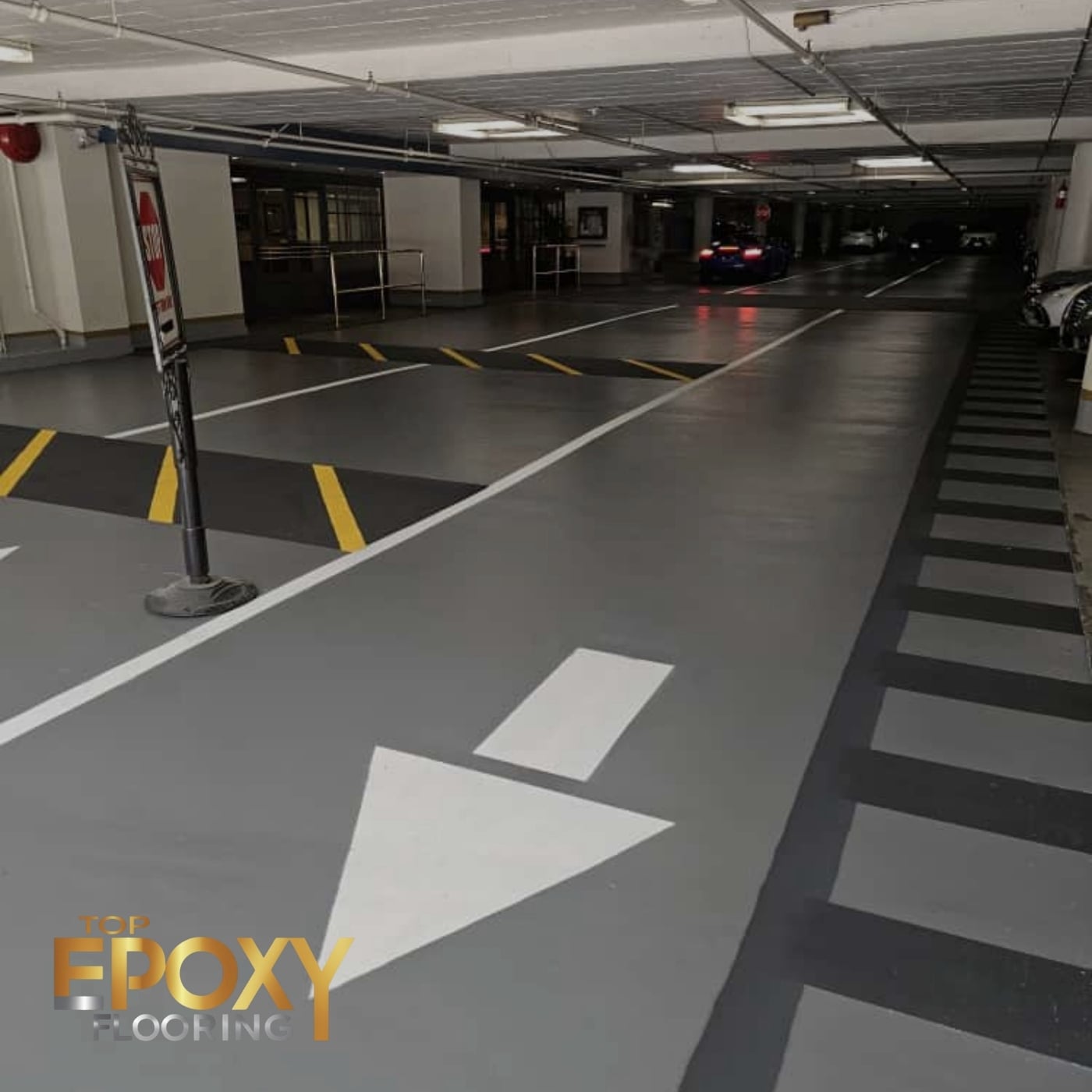 sand finish epoxy floor in parking lot